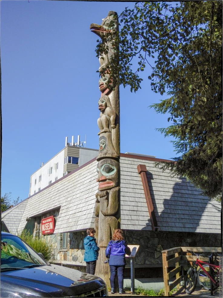 The Raven Stealing the Sun totem pole in front of the Ketchikan Library